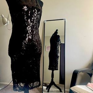 Black New dress  size M  closure in the back sleeveless